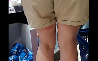 White Dam in booty shorts