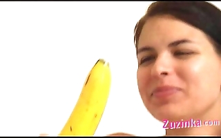 How-to: youthful brunette girl teaches without fail a banana